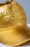 GOLD MAGA HAT SCULPTURE